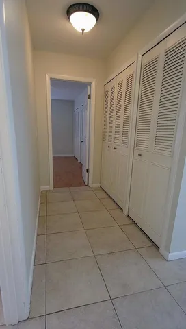 a view of entryway with bathroom