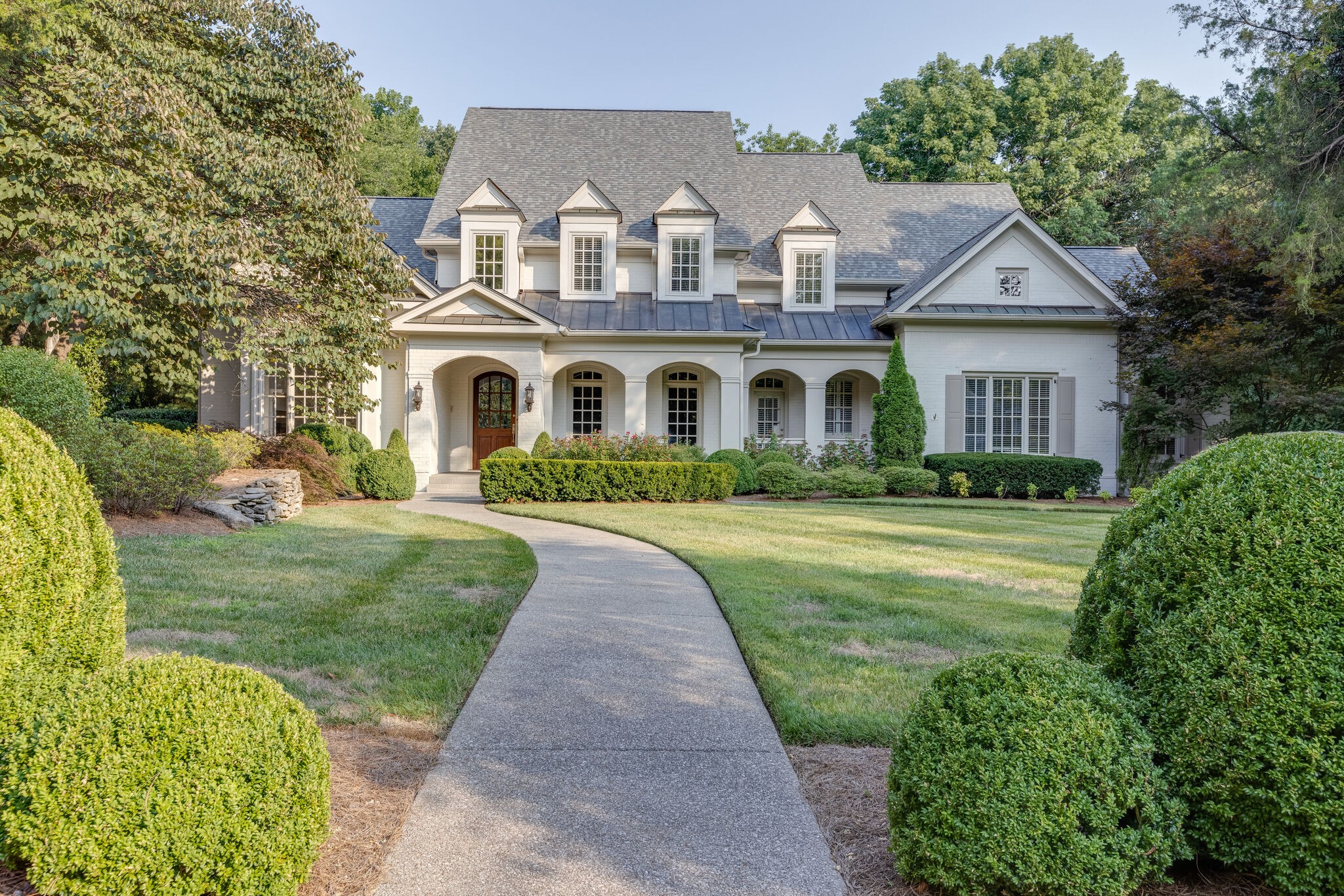 1438 Willowbrooke Circle Franklin, TN 37069 - Photo 2 of 45 a front view of a house with a yard