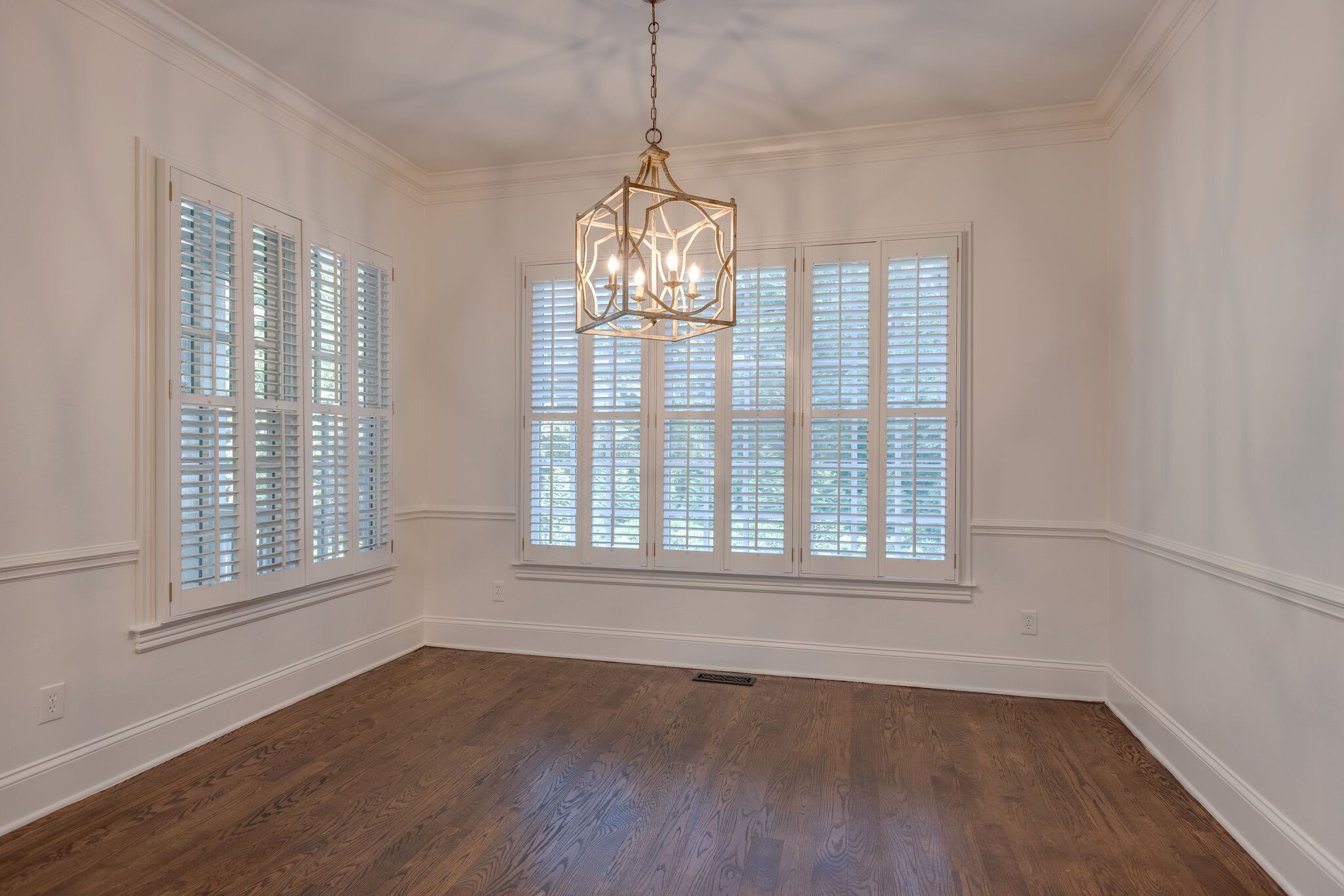 1438 Willowbrooke Circle Franklin, TN 37069 - Photo 19 of 45 an empty room with wooden floor fan and windows