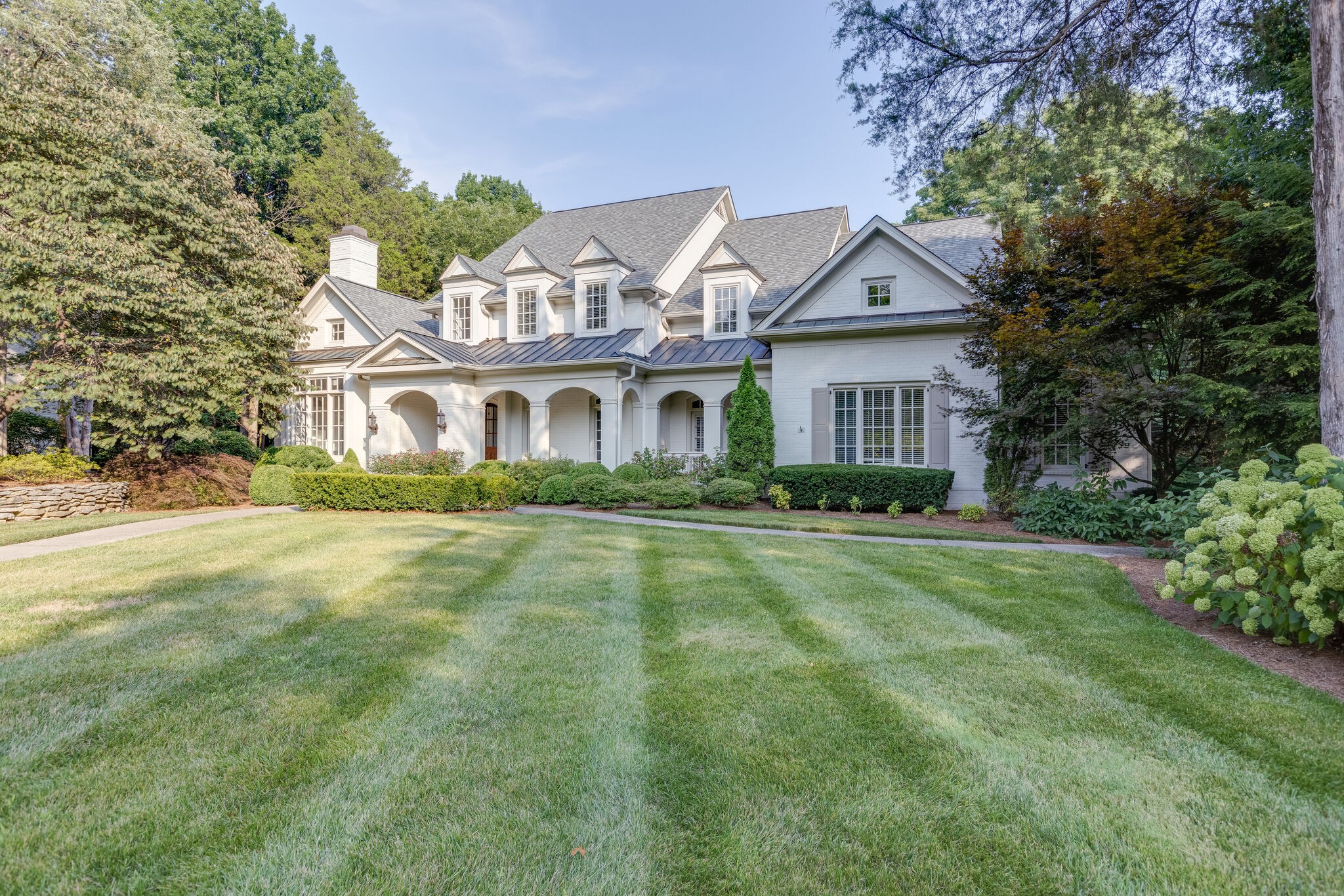 1438 Willowbrooke Circle Franklin, TN 37069 - Photo 3 of 45 a front view of a house with a yard and trees