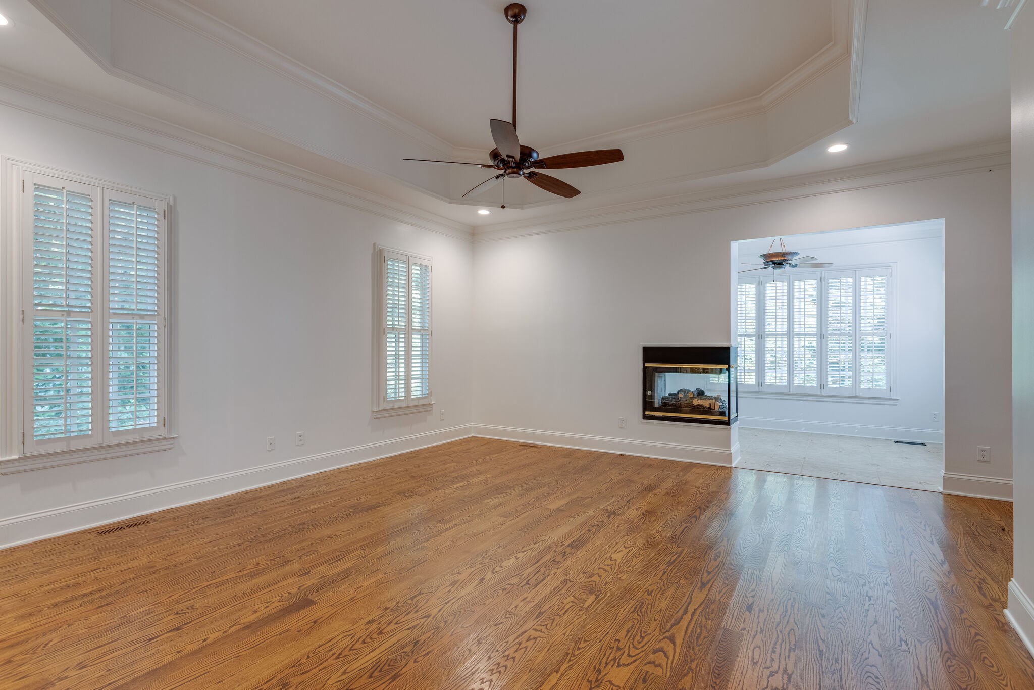 1438 Willowbrooke Circle Franklin, TN 37069 - Photo 25 of 45 a view of an empty room with wooden floor and a window