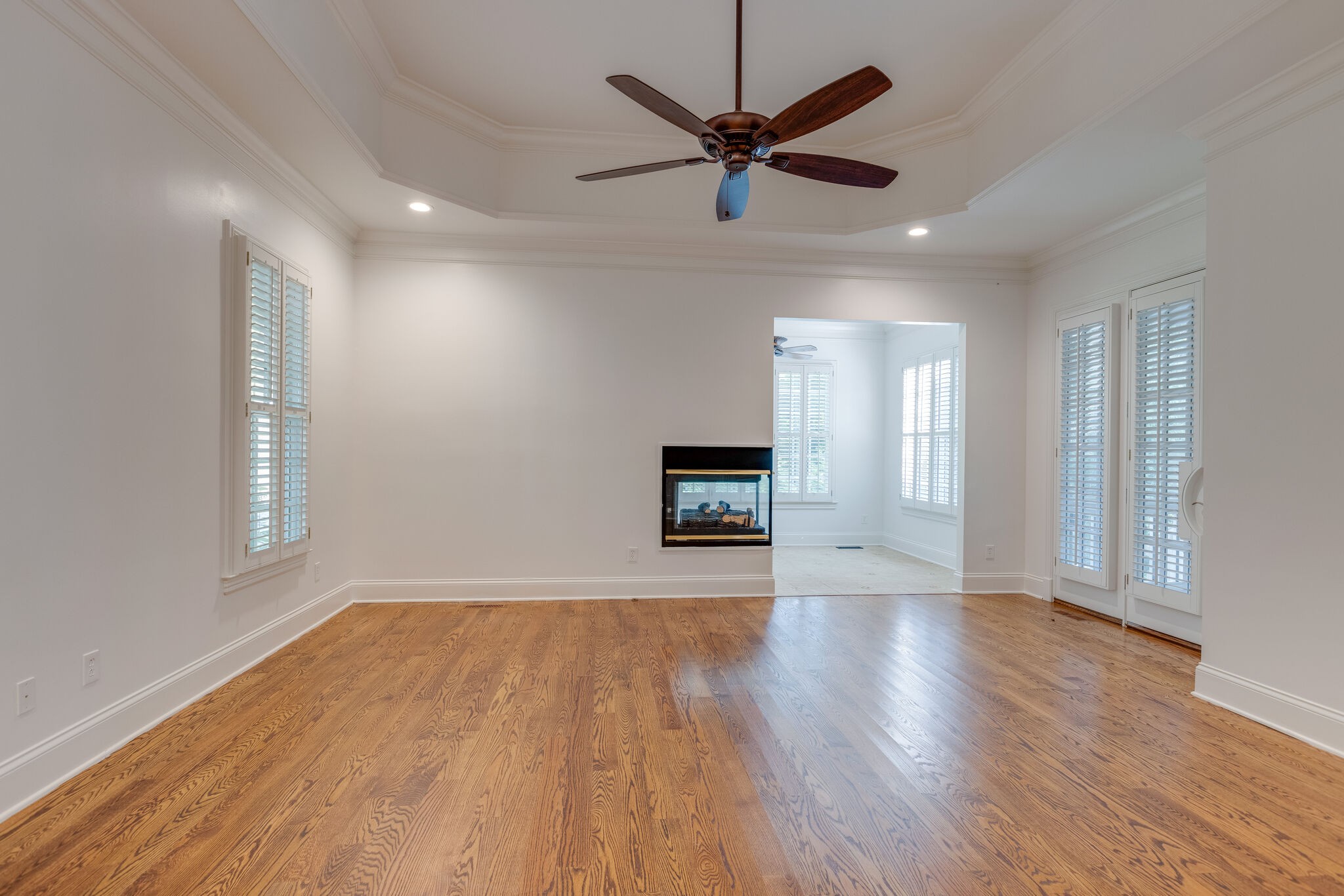 1438 Willowbrooke Circle Franklin, TN 37069 - Photo 26 of 45 a view of an empty room with a window and wooden floor
