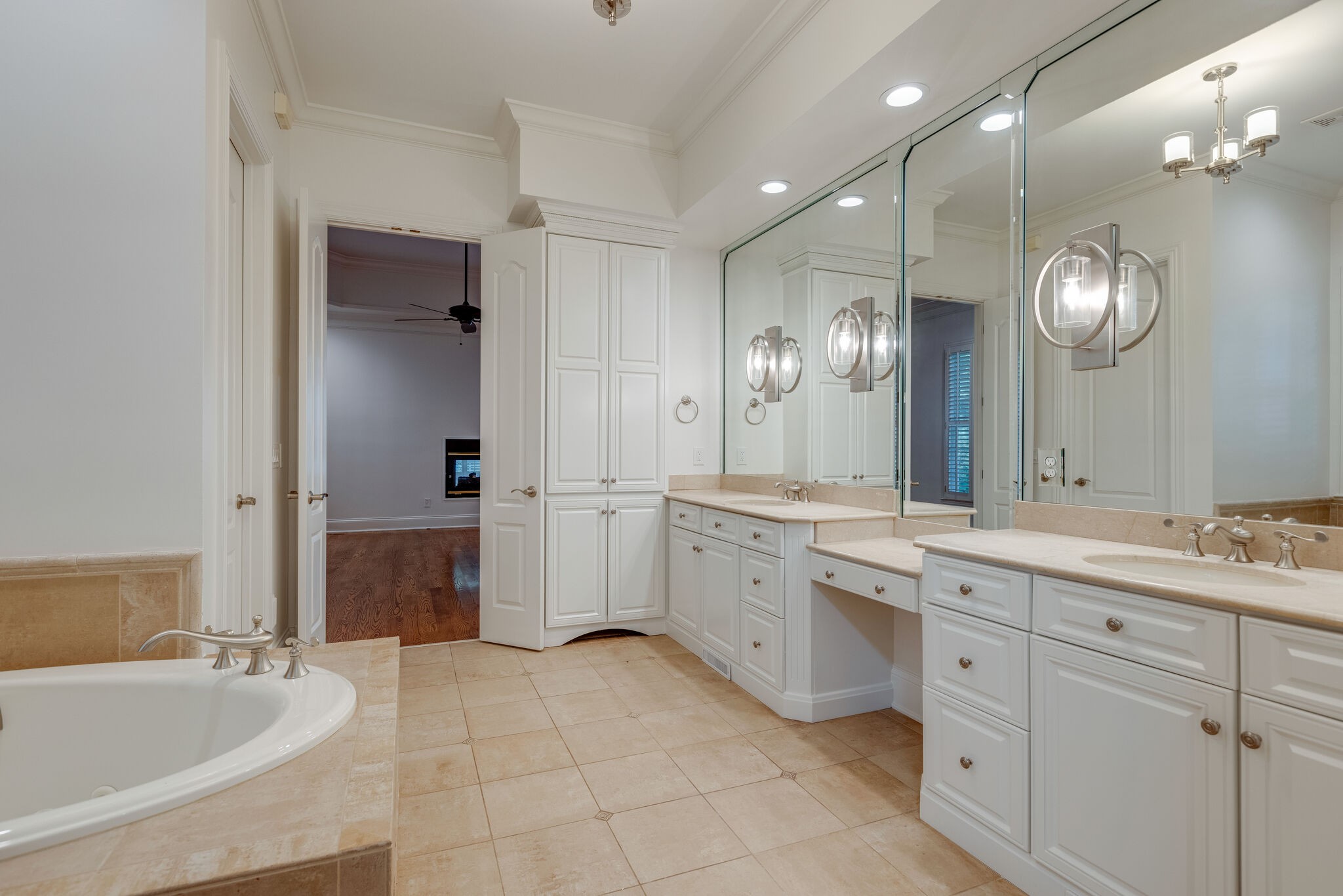 1438 Willowbrooke Circle Franklin, TN 37069 - Photo 29 of 45 a spacious en suite bathroom with a granite countertop sink mirror and bathtub