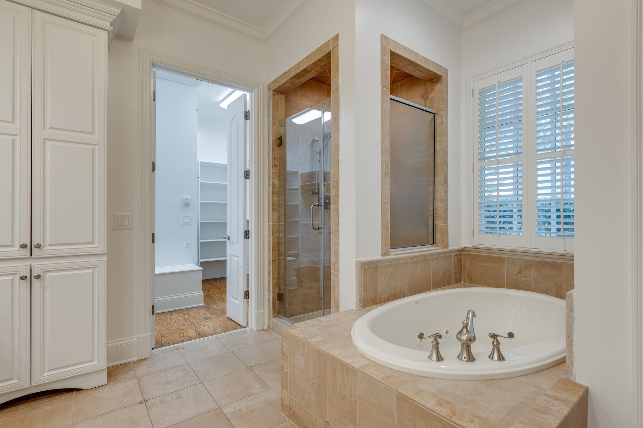 1438 Willowbrooke Circle Franklin, TN 37069 - Photo 30 of 45 a bathroom with a tub and shower