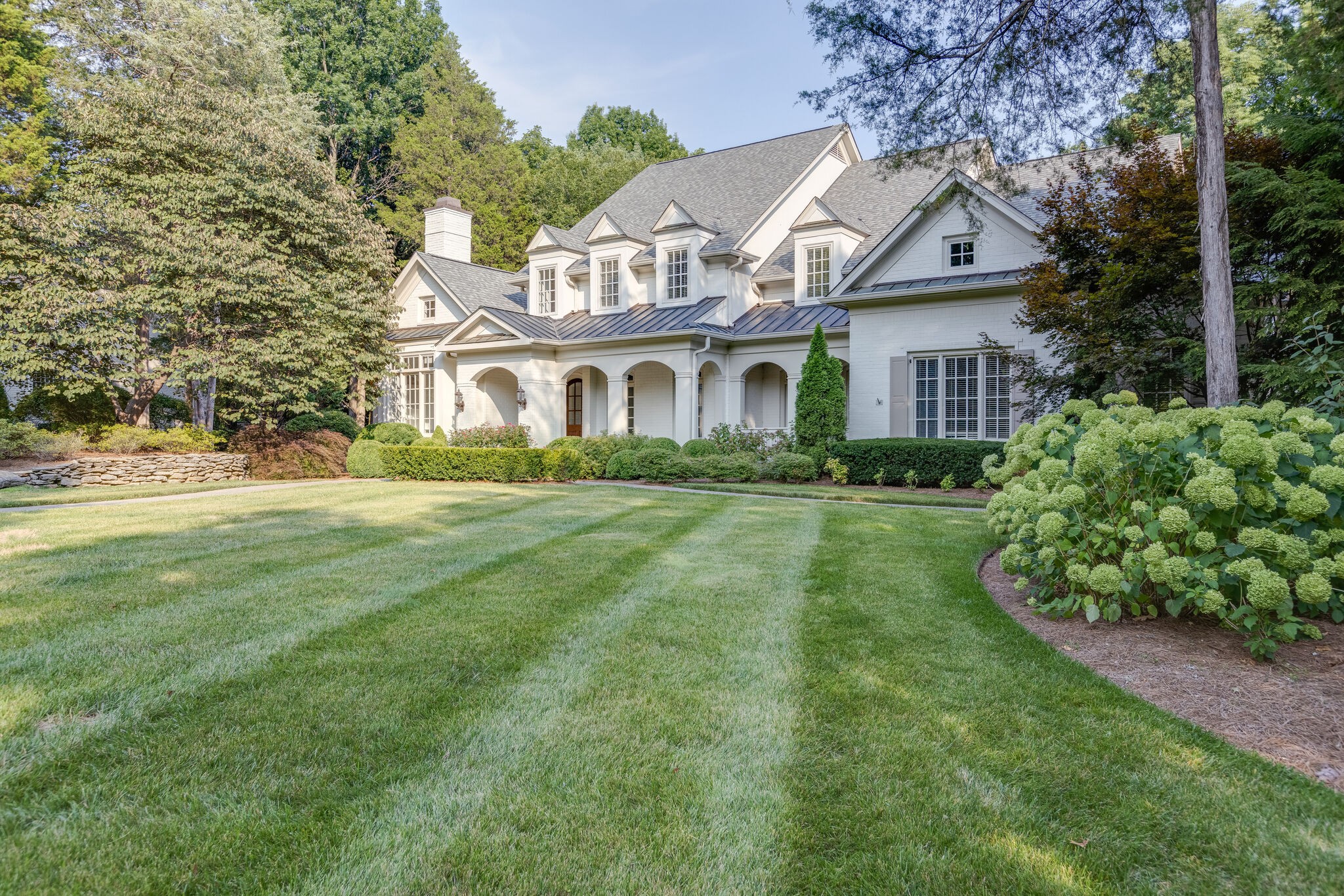 1438 Willowbrooke Circle Franklin, TN 37069 - Photo 4 of 45 a front view of a house with a garden