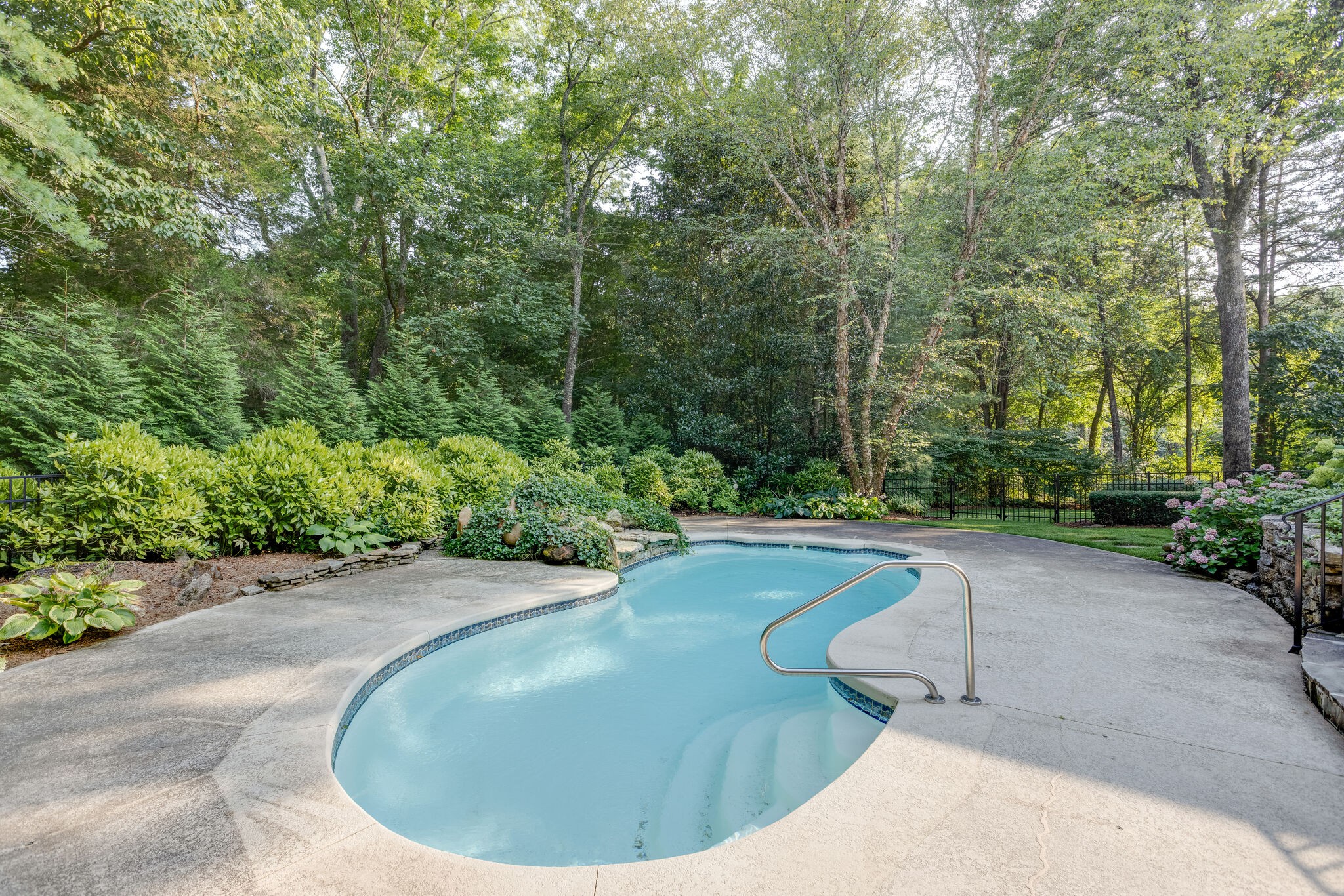 1438 Willowbrooke Circle Franklin, TN 37069 - Photo 44 of 45 a view of a swimming pool with a sitting area