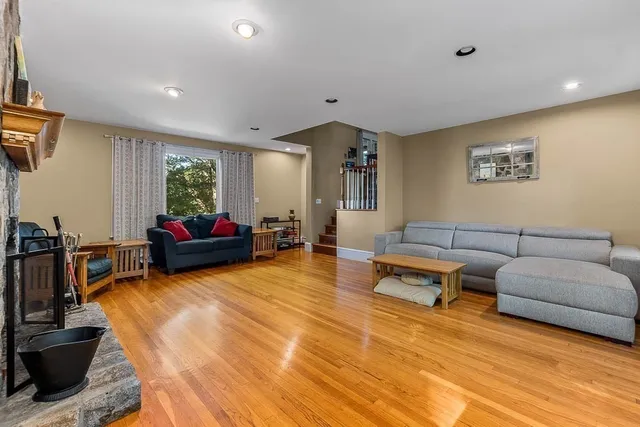 a living room with furniture and a window