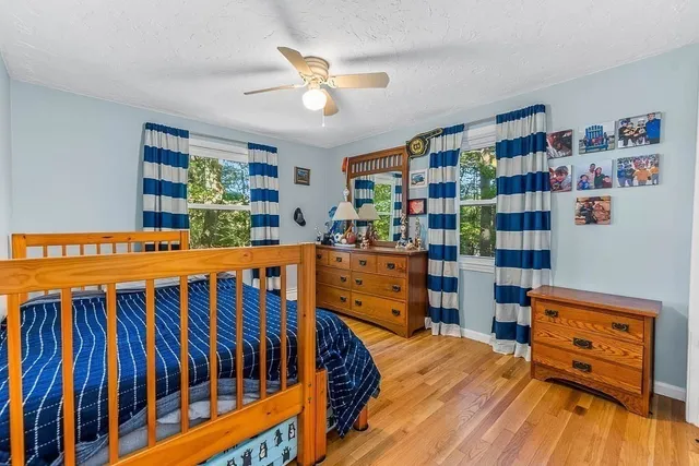 a bedroom with a bed and a cabinets
