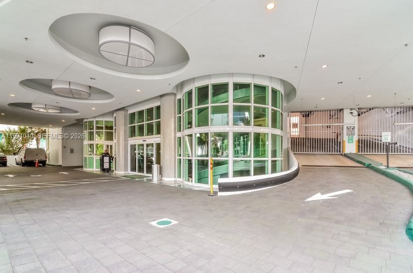 218 Southeast 14th Street, Unit 1007 Miami, FL 33131 - Photo 18 of 32 a view of an empty room with a window