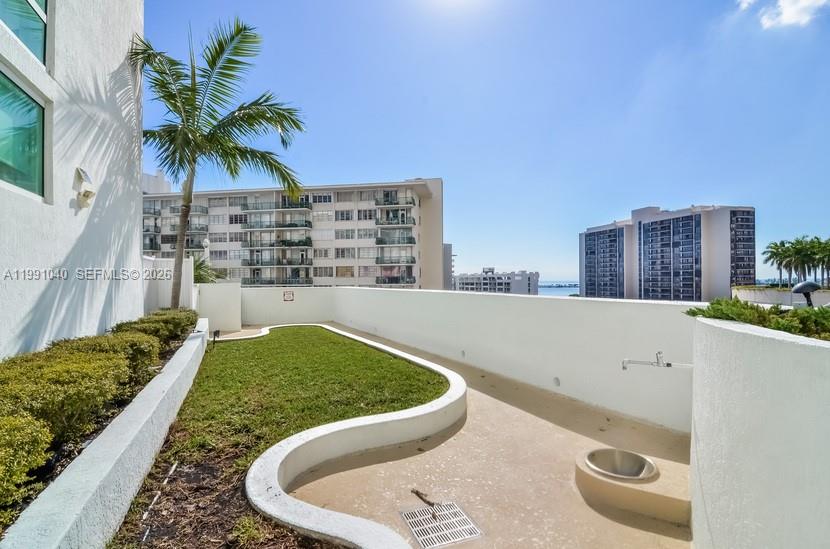 218 Southeast 14th Street, Unit 1007 Miami, FL 33131 - Photo 20 of 32 a view of swimming pool from a balcony