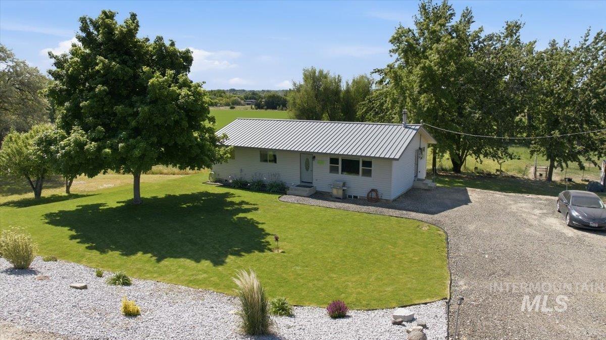 6323 Foothill Road Star, ID 83669 - Photo 50 of 50 Single-story residence featuring a gray metal roof and light-colored siding