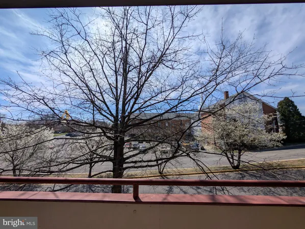 a view of swimming pool with a yard