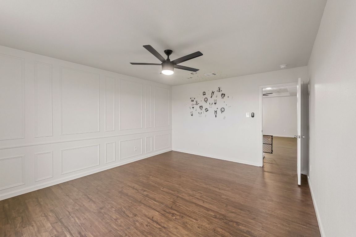 240 Nectar Drive Buda, TX 78610 - Photo 18 of 37 wooden floor in an empty room