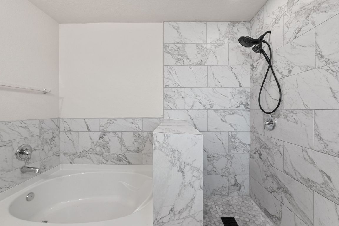 240 Nectar Drive Buda, TX 78610 - Photo 20 of 37 a bathroom with a sink