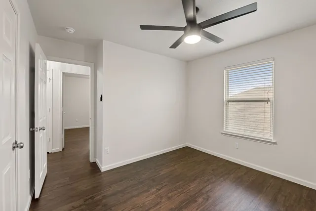a view of an empty walk in closet