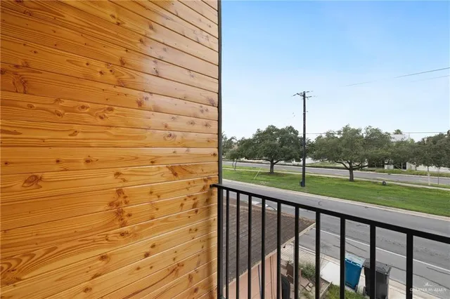 a view of a balcony with an outdoor space