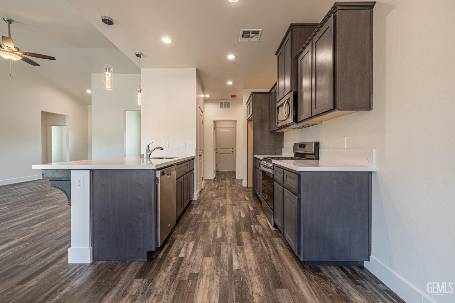 Undisclosed Address Tehachapi, CA 93561 - Photo 8 of 20 a large kitchen with stainless steel appliances