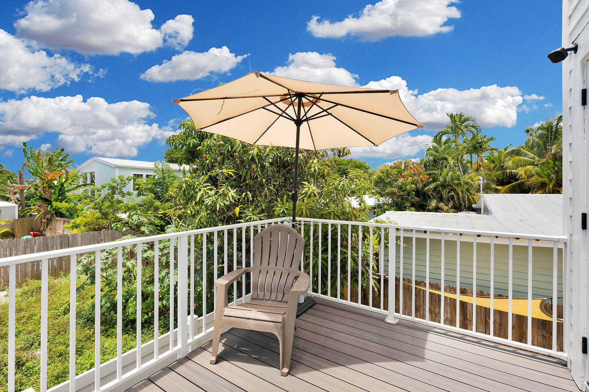 59 Ed Swift Road Key West, FL 33040 - Photo 25 of 35 a view of a balcony with wooden floor