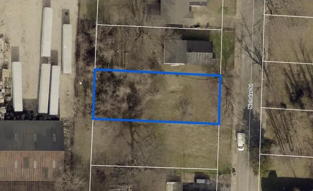 a bathroom with a shower and a sink