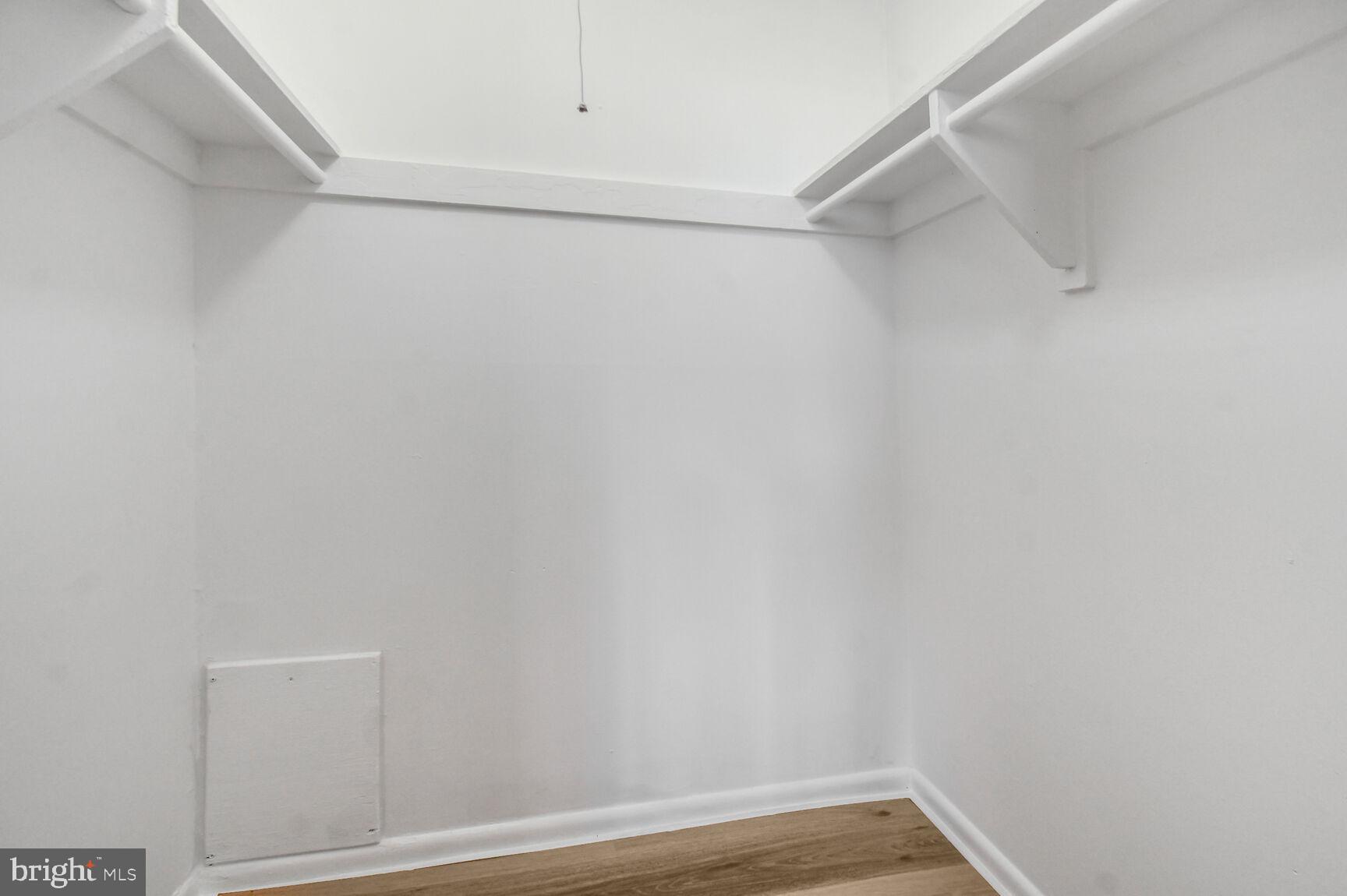 1804 Metzerott Road, Unit 106 Silver Spring, MD 20903 - Photo 11 of 15 a view of small space with racks on the wall