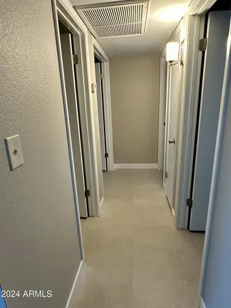 a bathroom with a sink mirror toilet and bathtub
