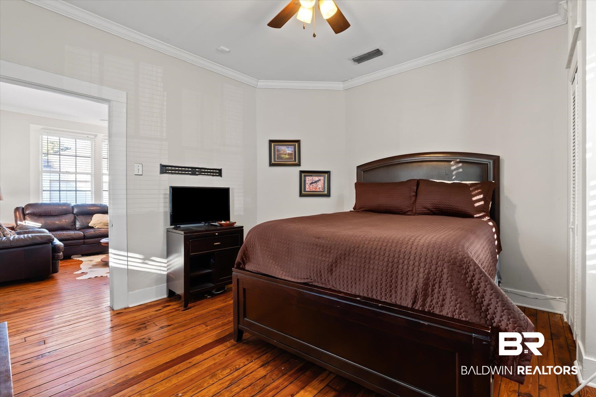 7 Rickarby Place Mobile, AL 36606 - Photo 15 of 20 Bedroom with hardwood / wood-style floors, ceiling fan, and ornamental molding