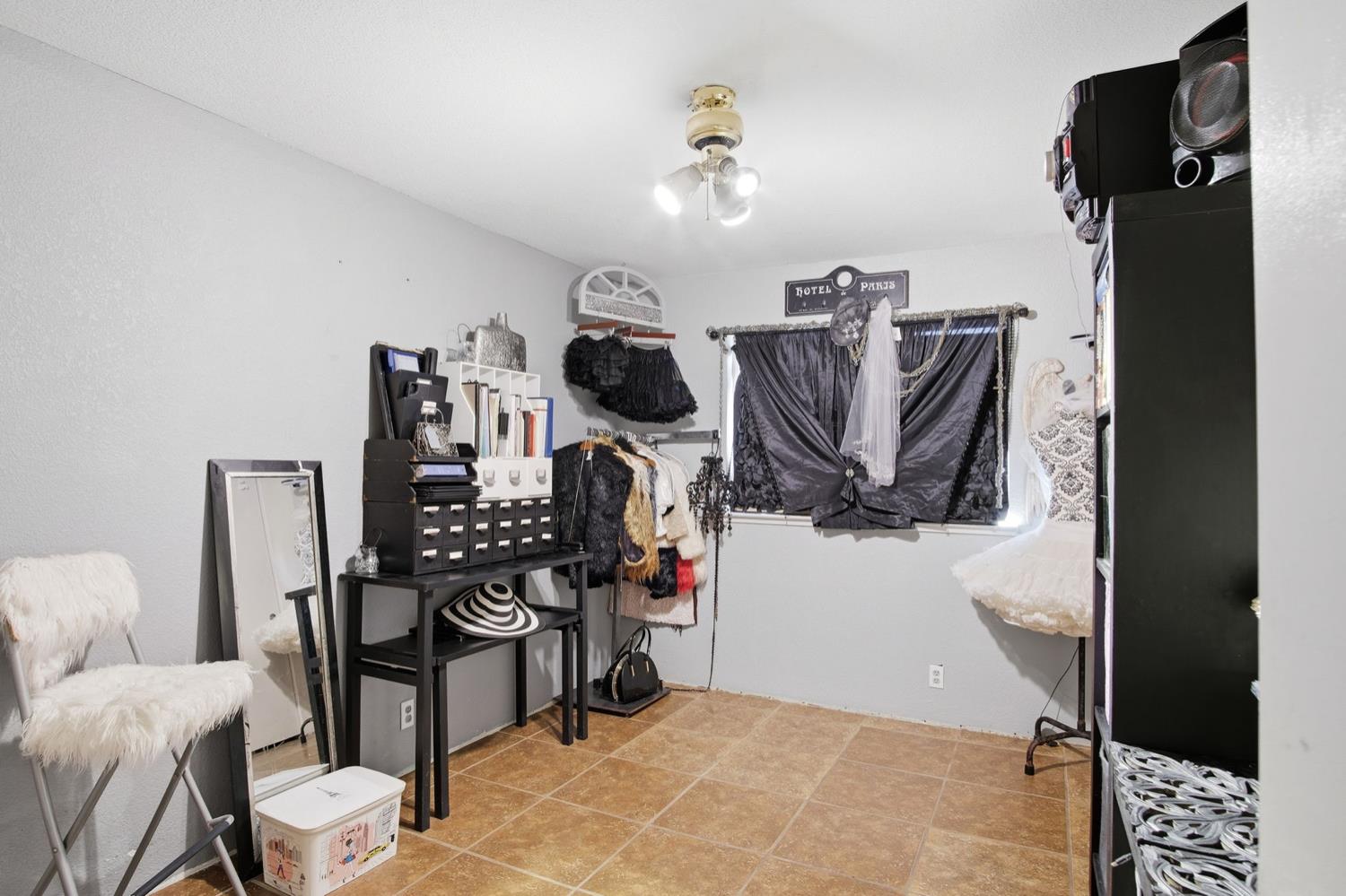 1429 Don Pedro Road Ceres, CA 95307 - Photo 13 of 21 a living room with furniture and wooden floor