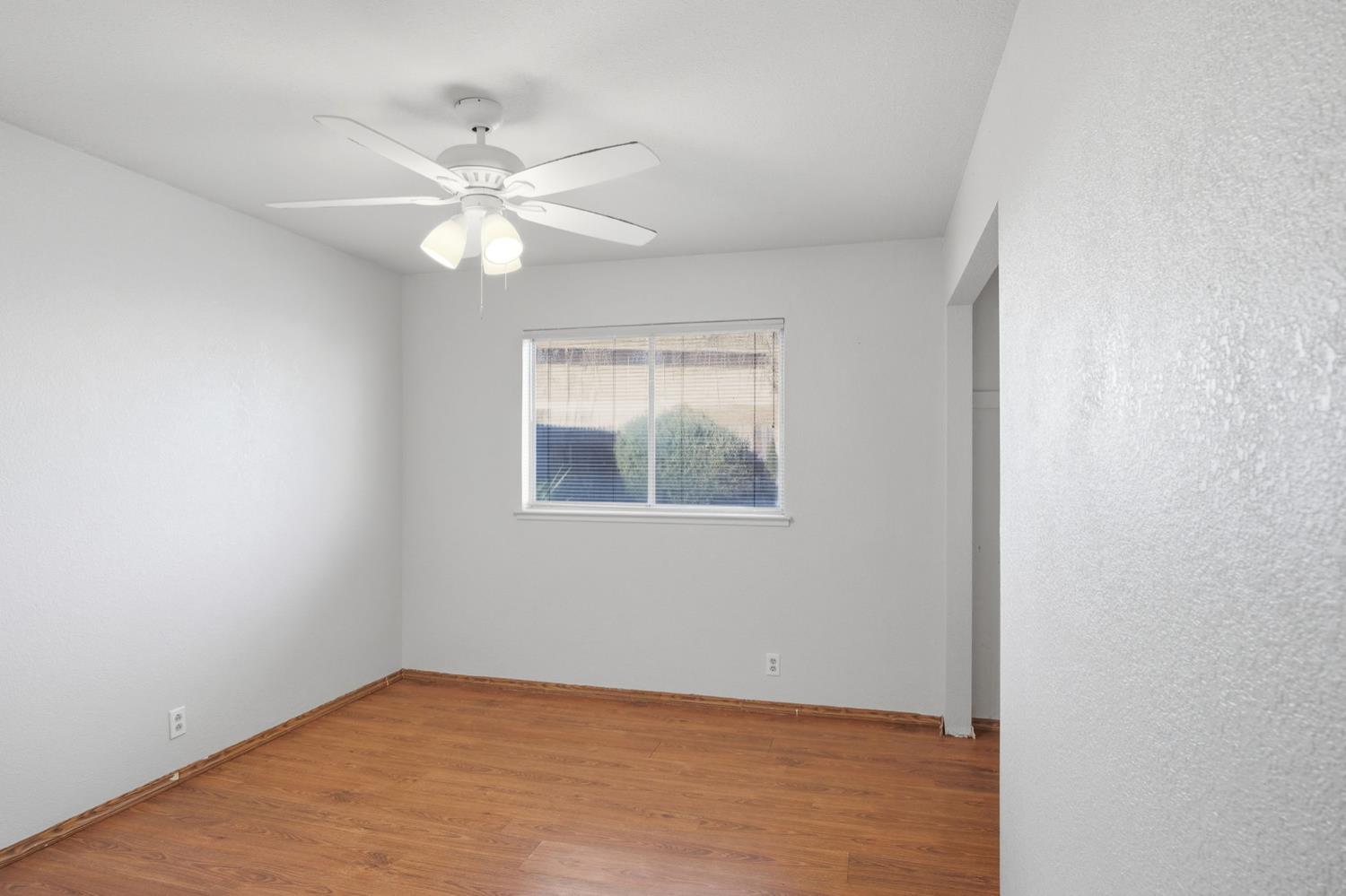 1429 Don Pedro Road Ceres, CA 95307 - Photo 14 of 21 a view of an empty room with a window