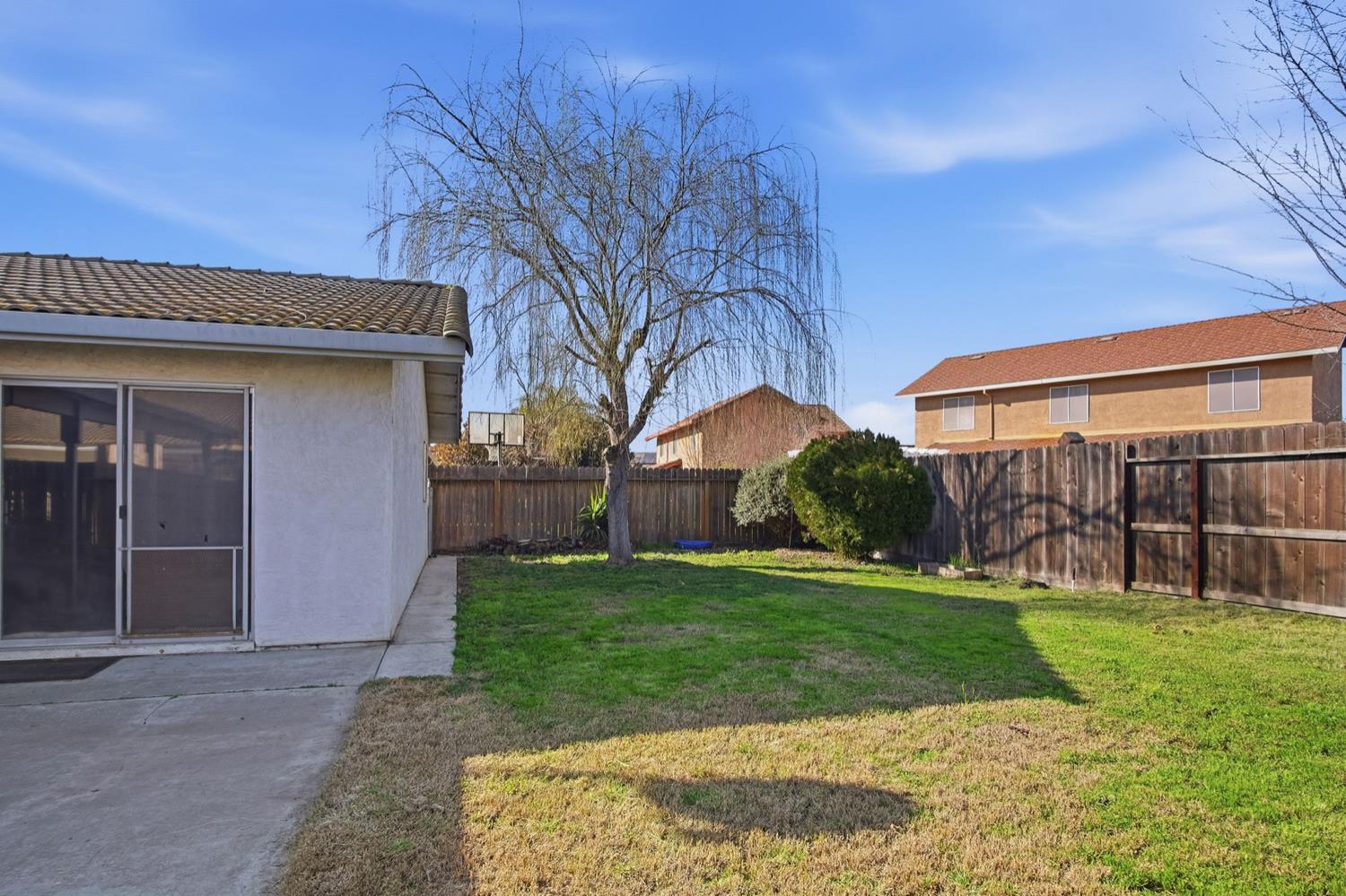 1429 Don Pedro Road Ceres, CA 95307 - Photo 19 of 21 a view of a house with a yard