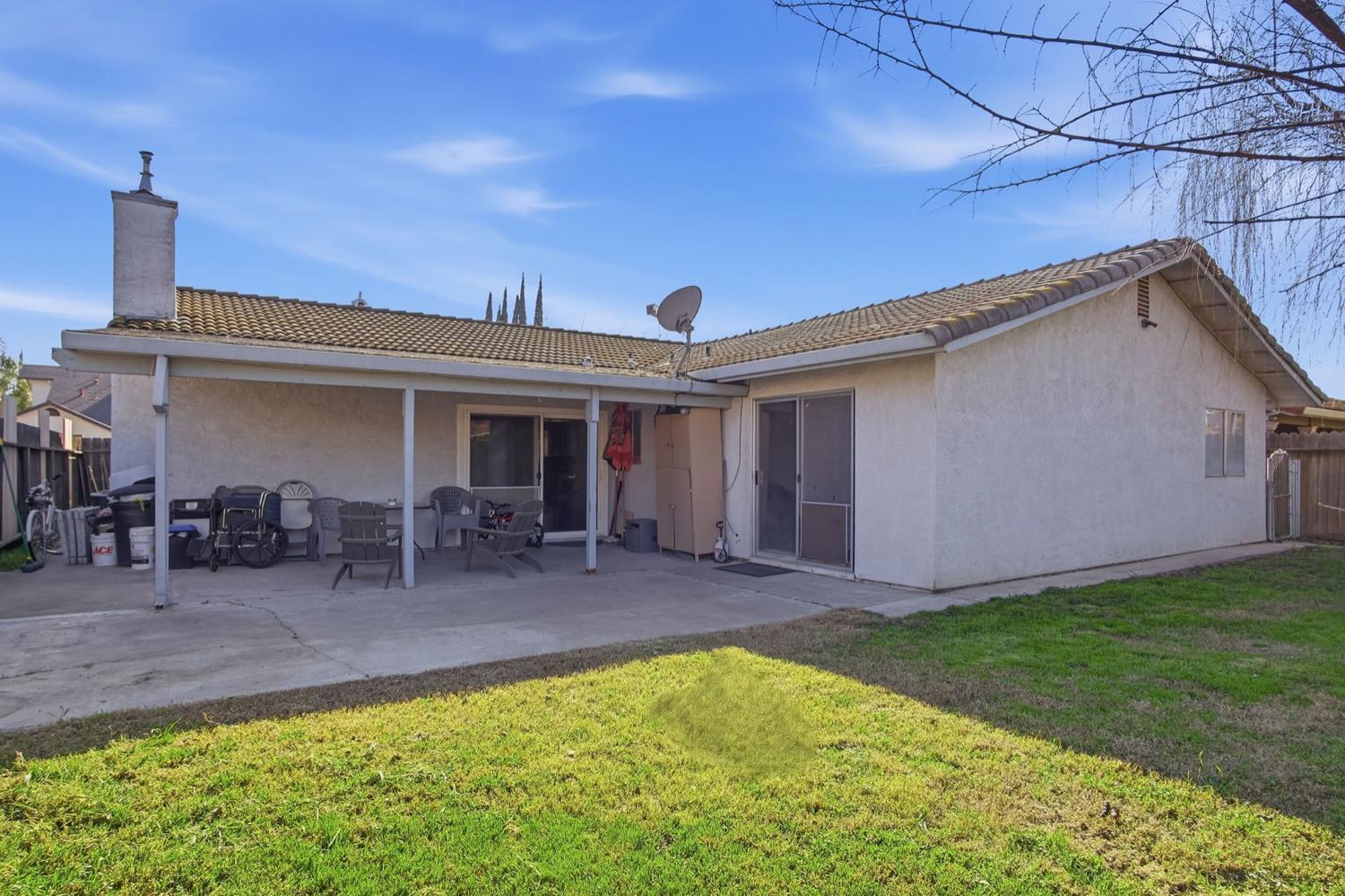 1429 Don Pedro Road Ceres, CA 95307 - Photo 21 of 21 a front view of house with yard and seating space