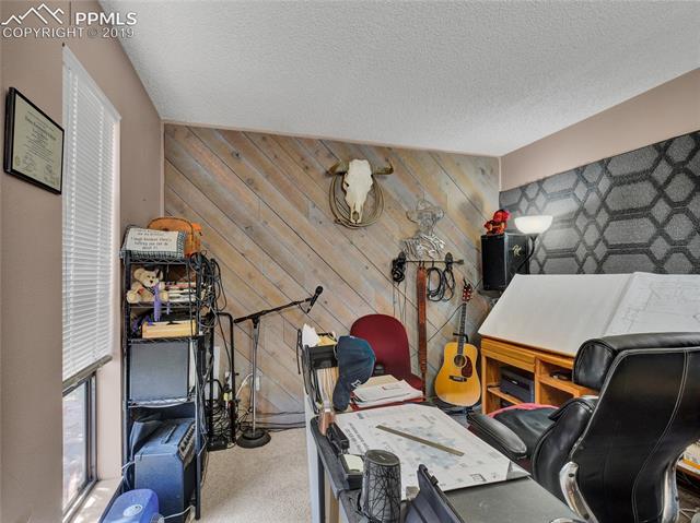 8725 Ute Road Cascade, CO 80809 - Photo 23 of 35 Bedroom 3 is currently being used as an office/music studio