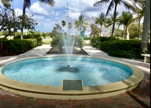 a view of a fountain in middle of the house