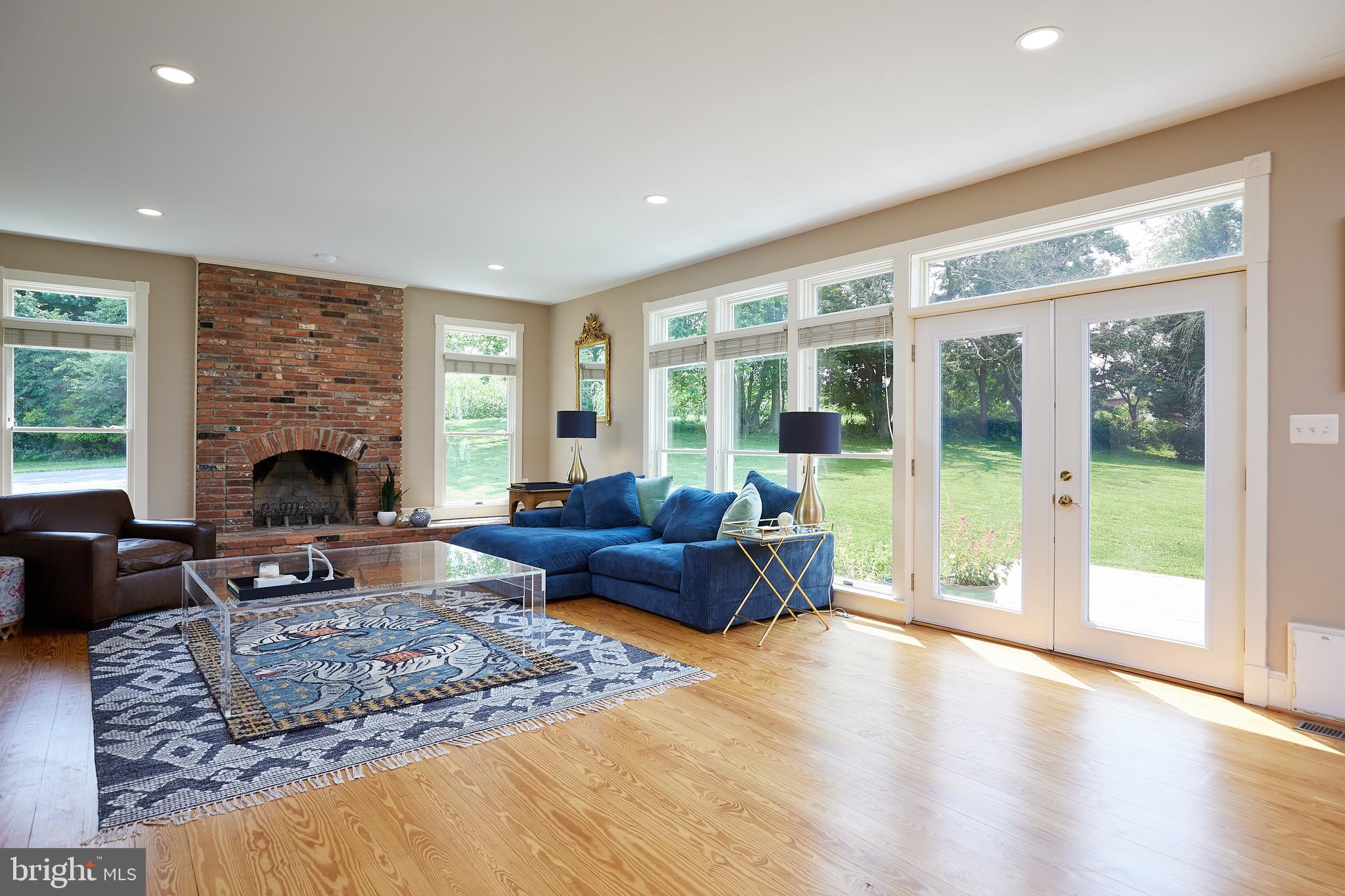 19100 Barnesville Road Barnesville, MD 20838 - Photo 12 of 70 Family Room with fireplace and access to deck
