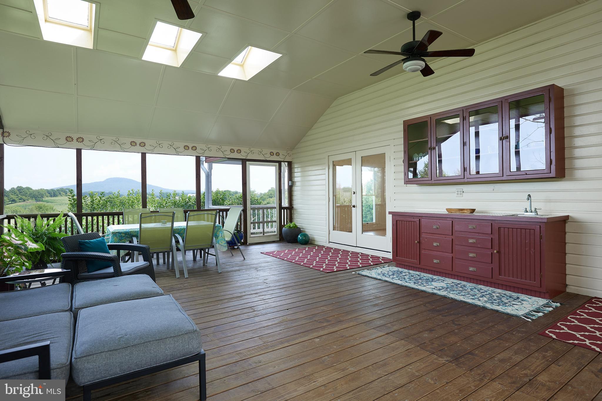 19100 Barnesville Road Barnesville, MD 20838 - Photo 15 of 70 Screened porch with wet bar