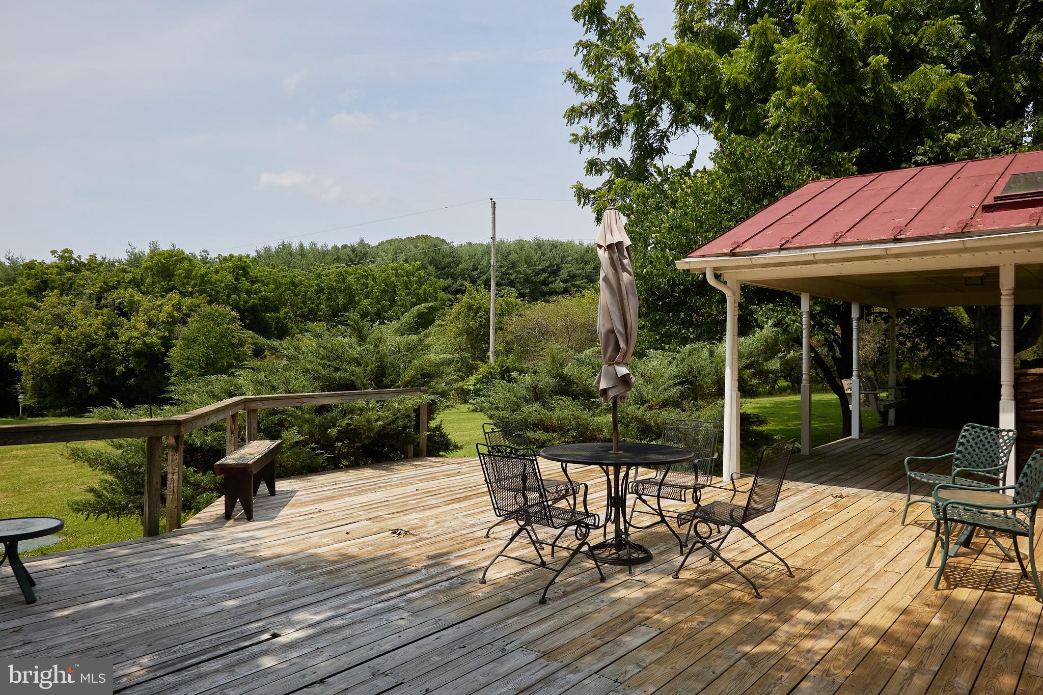 19100 Barnesville Road Barnesville, MD 20838 - Photo 51 of 70 Deck area with views of pastures and ponds