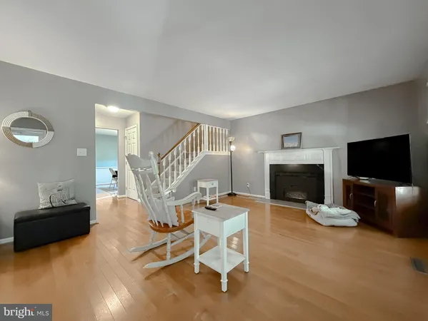 a living room with a fireplace