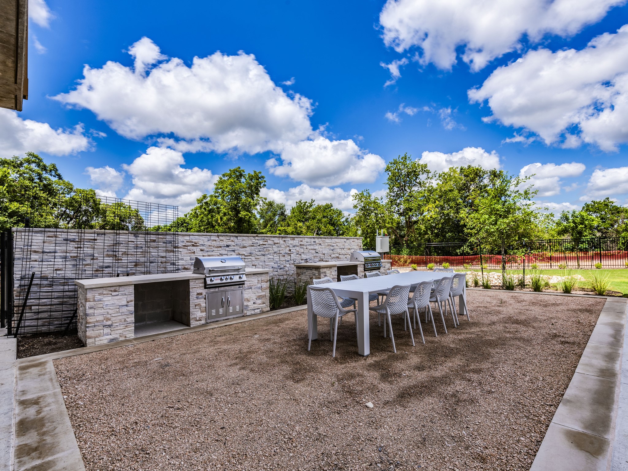 4802 South Congress Avenue, Unit 310 Austin, TX 78745 - Photo 18 of 37 View of patio / terrace with an outdoor kitchen / dining area