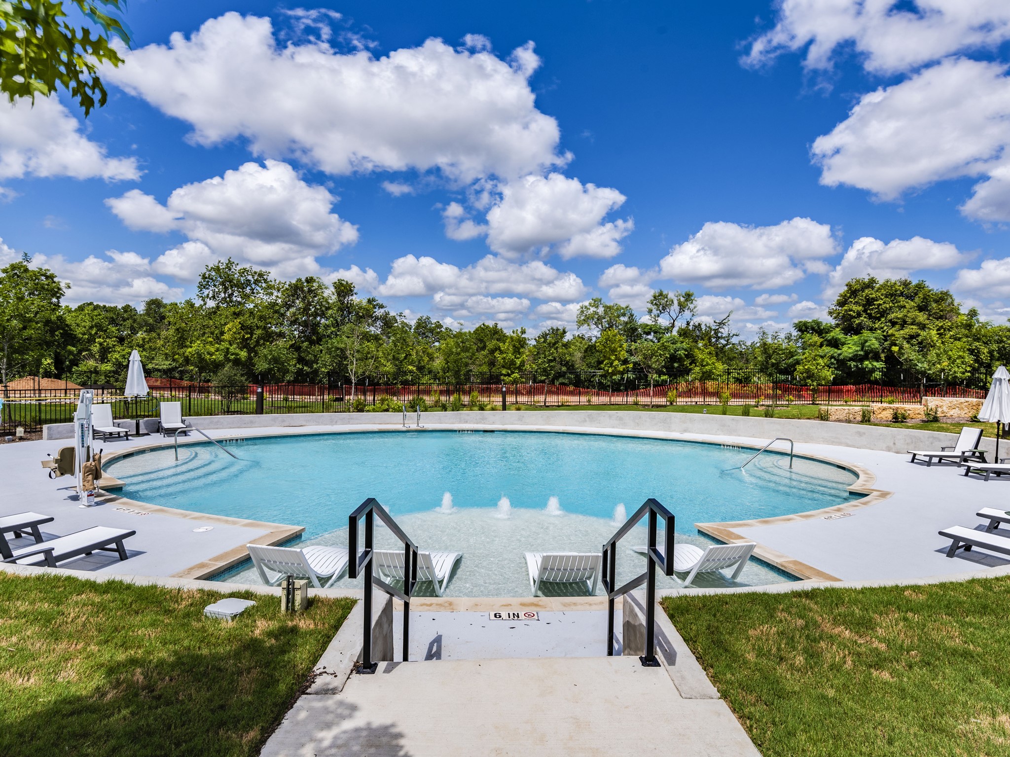 4802 South Congress Avenue, Unit 310 Austin, TX 78745 - Photo 21 of 37 Community pool featuring a patio and view of the greenbelt area