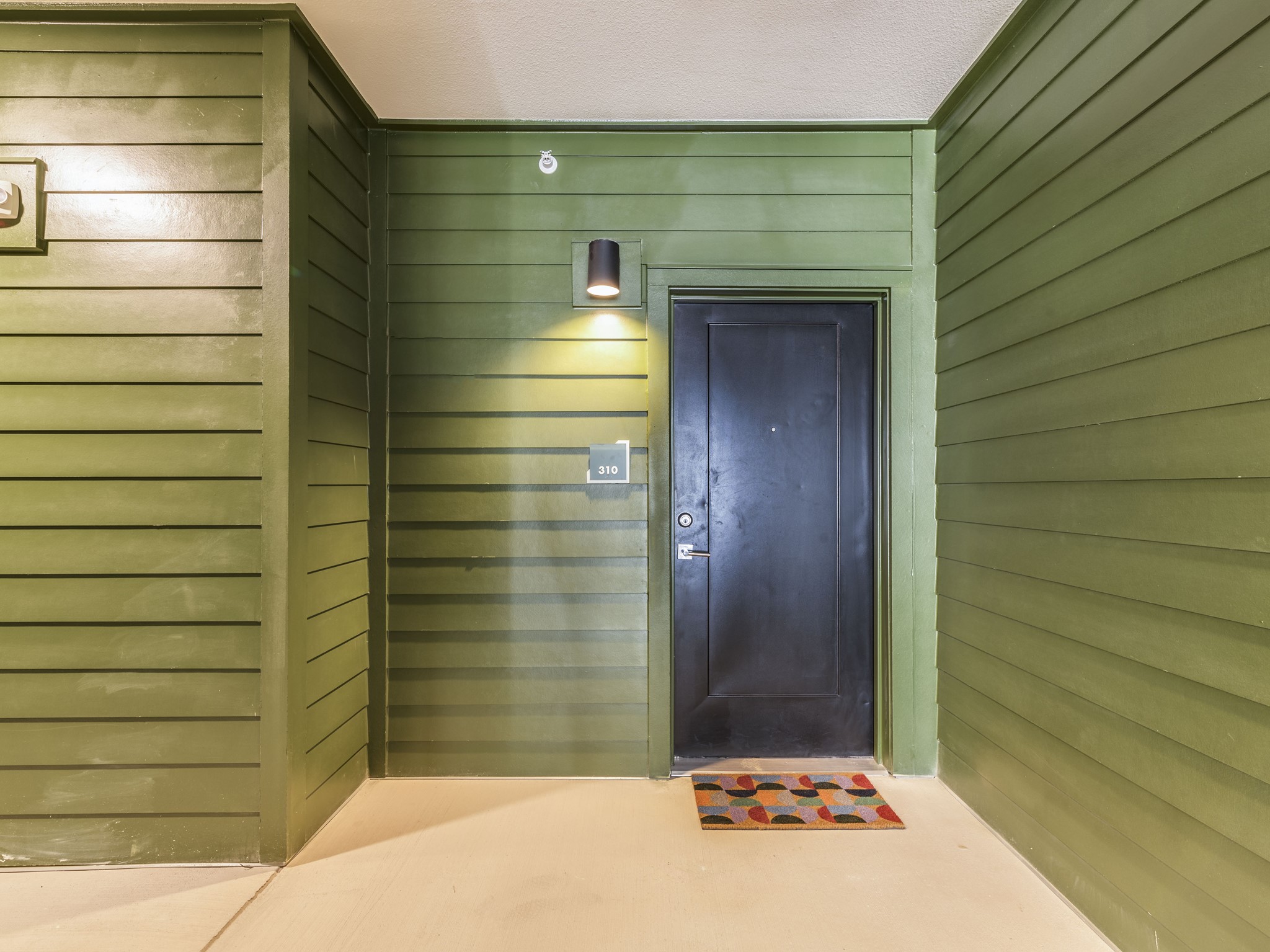 4802 South Congress Avenue, Unit 310 Austin, TX 78745 - Photo 4 of 37 Property entrance-elevator from the secure garage is just down the hall