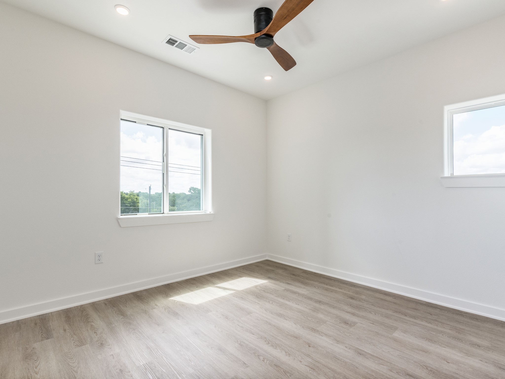 4802 South Congress Avenue, Unit 310 Austin, TX 78745 - Photo 8 of 37 Bedroom boasts natural light, designer fan and a walk in closet