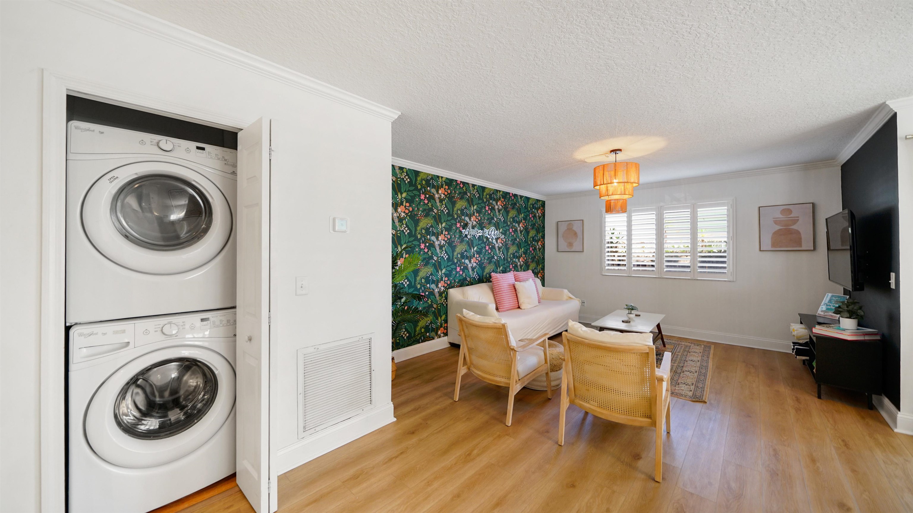 108 A Street, Unit A St. Augustine, FL 32080 - Photo 12 of 38 a view of a livingroom with furniture a fireplace and wooden floor
