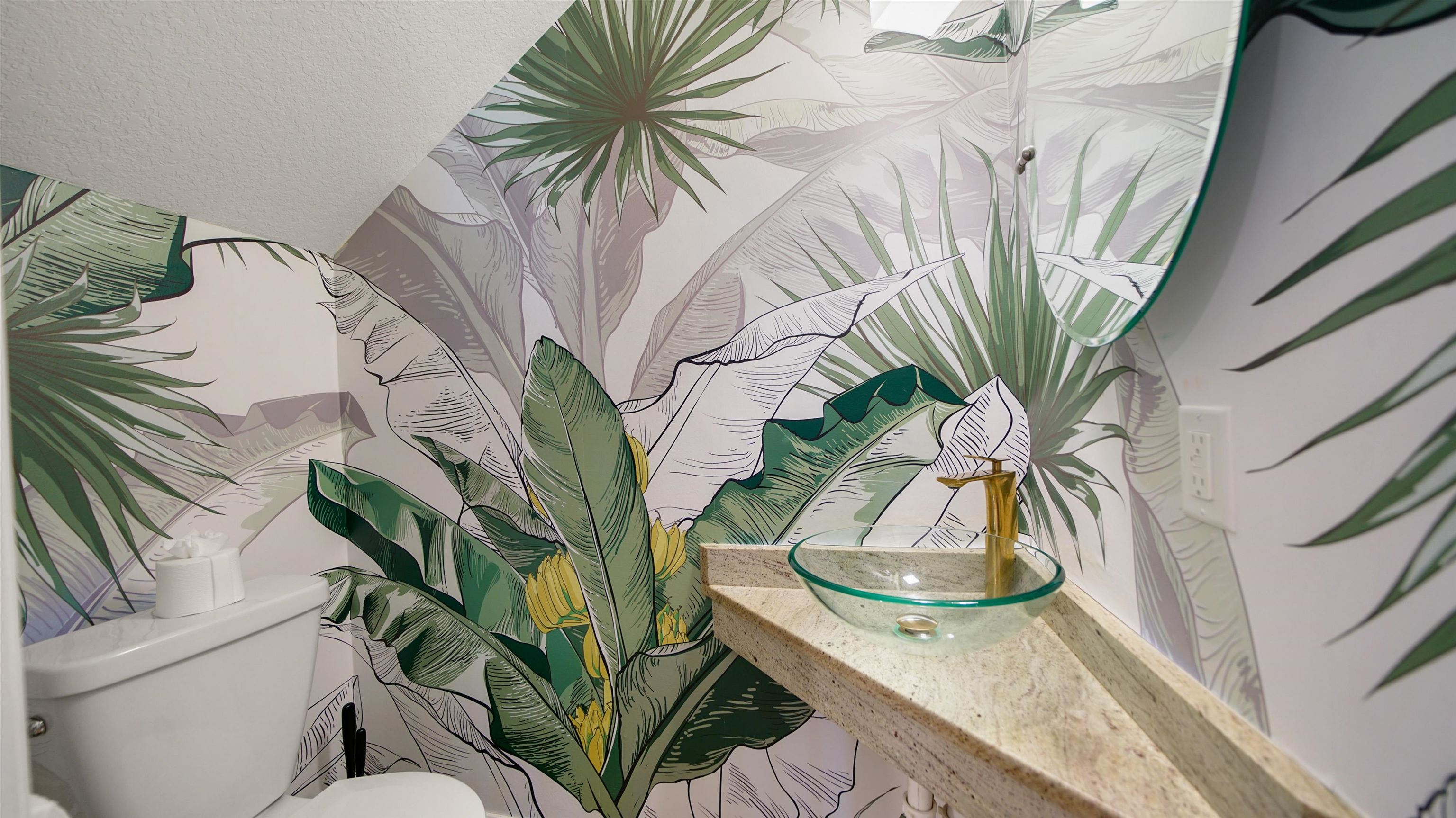 108 A Street, Unit A St. Augustine, FL 32080 - Photo 14 of 38 a vase of flowers sitting on a table with chairs