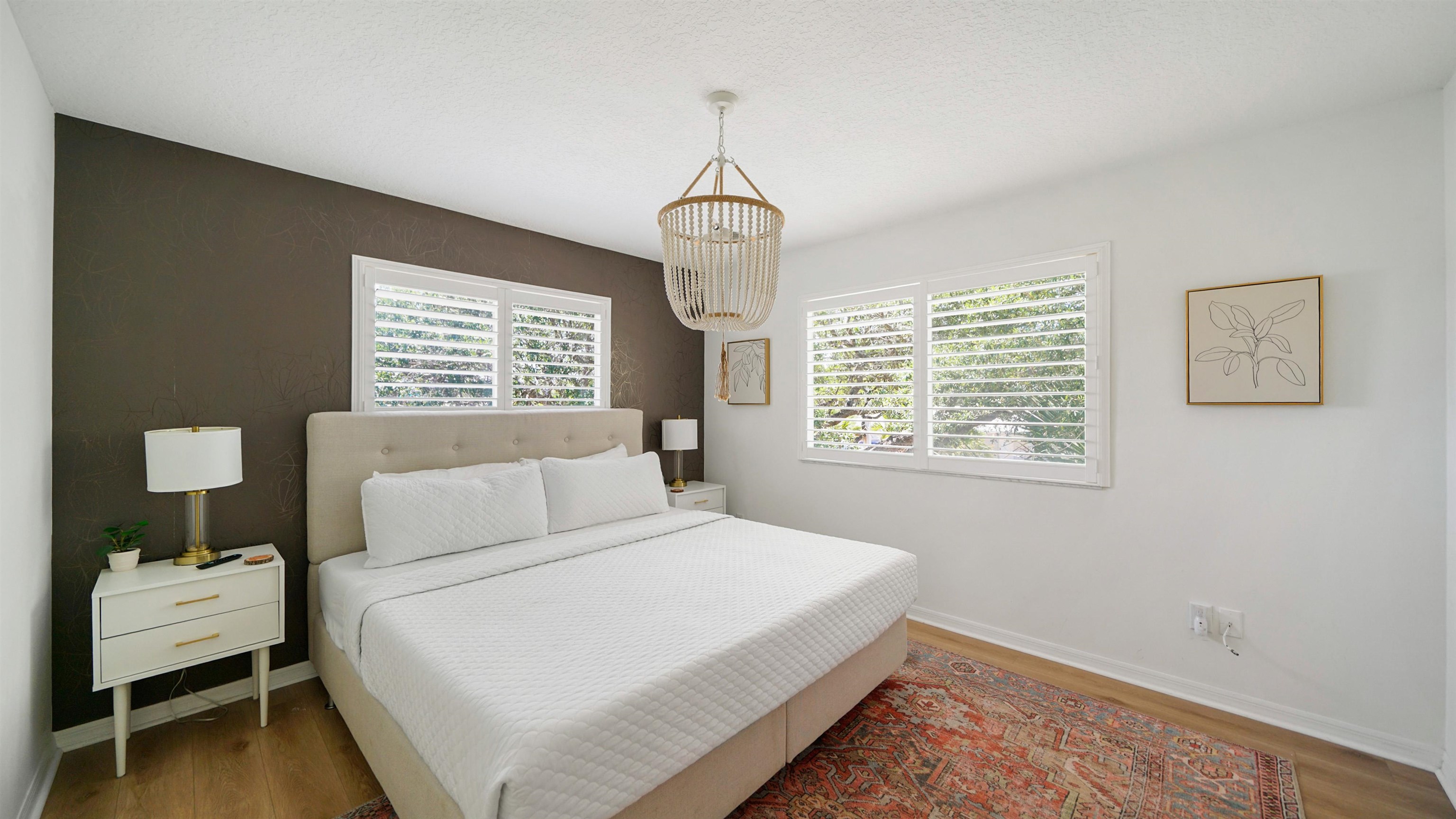 108 A Street, Unit A St. Augustine, FL 32080 - Photo 16 of 38 a bedroom with a bed and a window