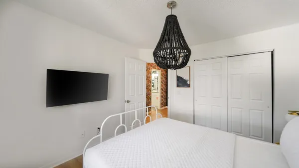 a front view of a livingroom with flat screen tv