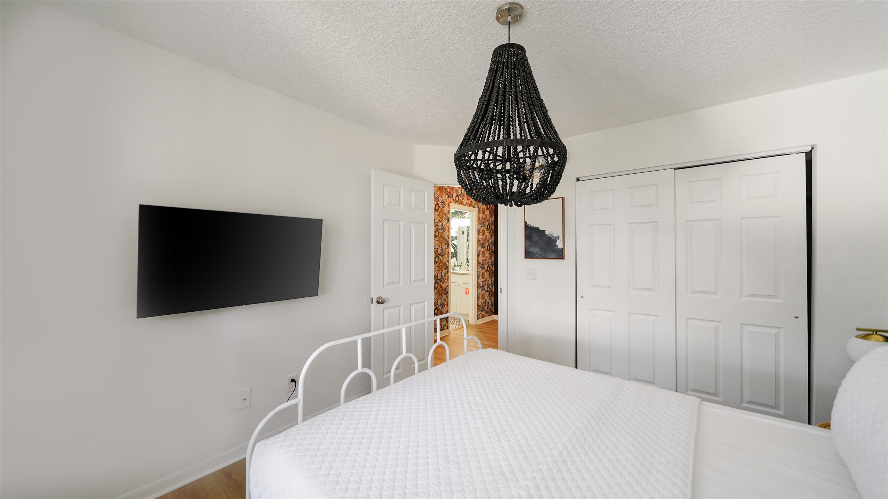 108 A Street, Unit A St. Augustine, FL 32080 - Photo 21 of 38 a front view of a livingroom with flat screen tv