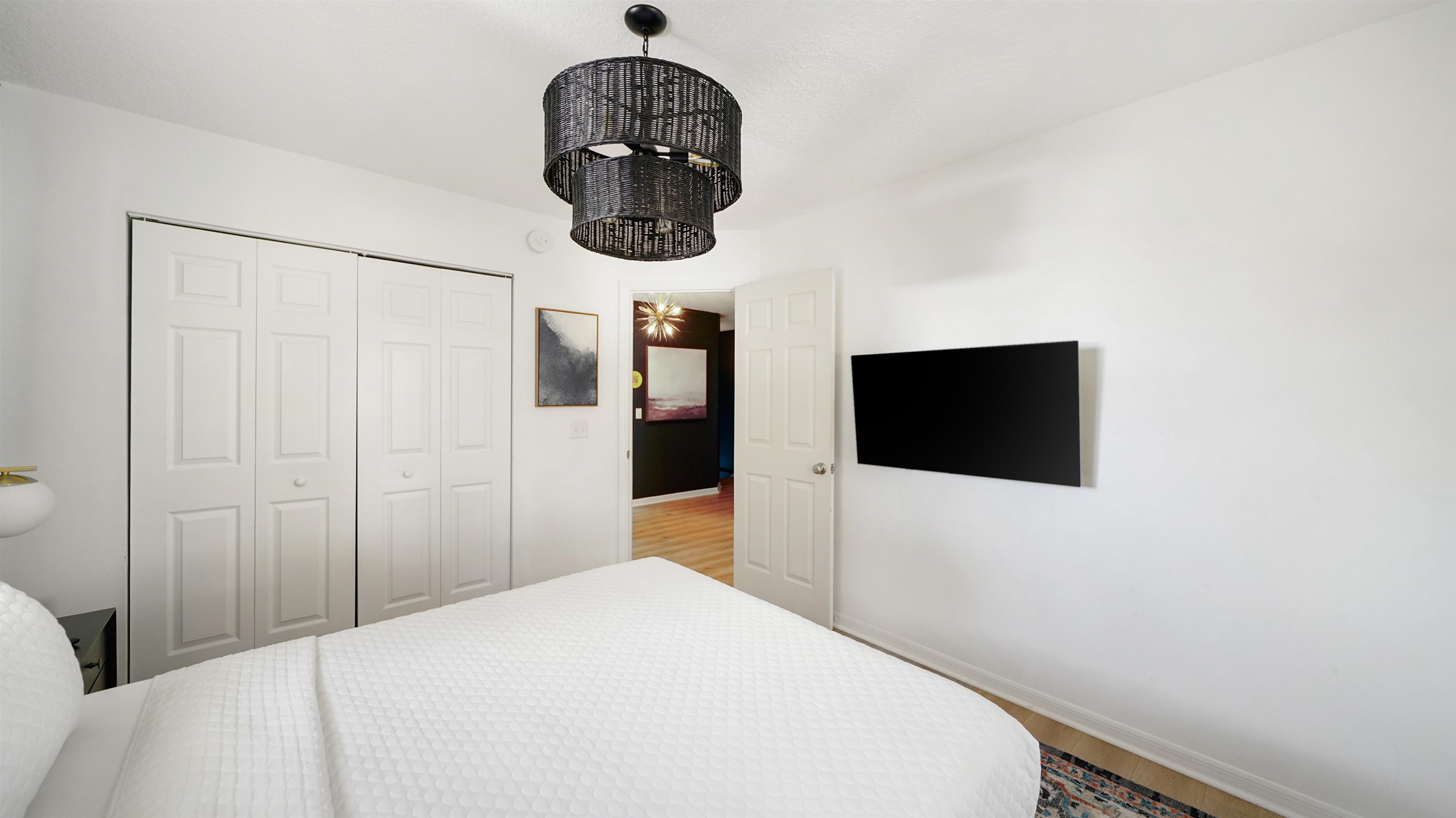 108 A Street, Unit A St. Augustine, FL 32080 - Photo 24 of 38 a bedroom with a bed and a television