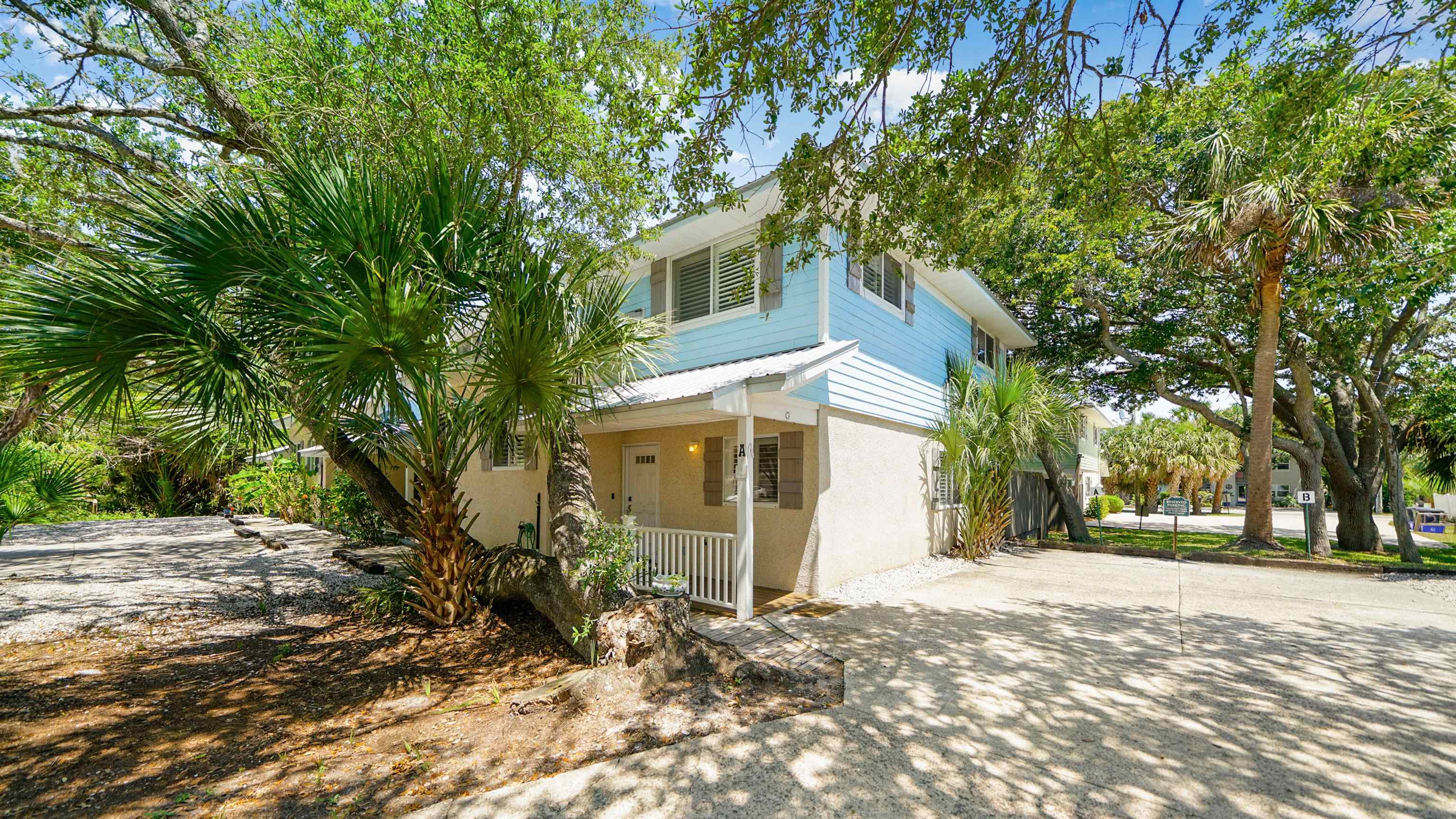 108 A Street, Unit A St. Augustine, FL 32080 - Photo 25 of 38 a view of a house with a tree