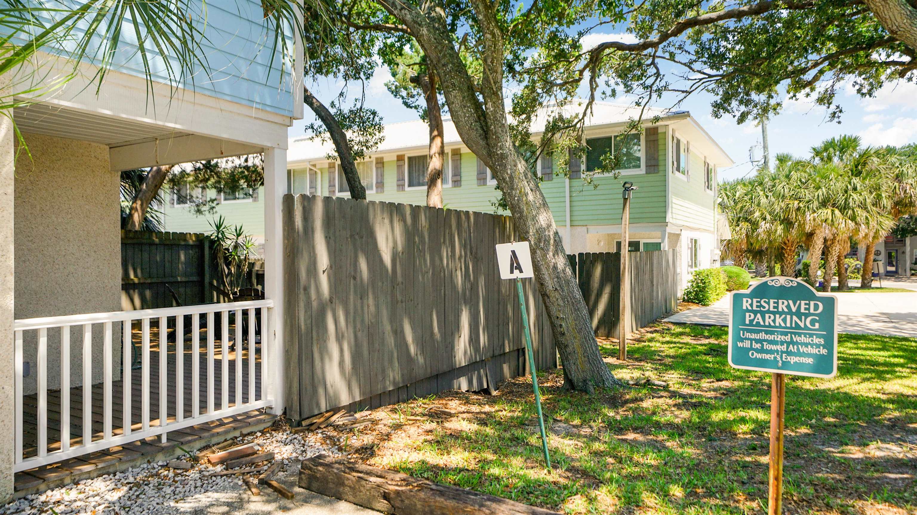 108 A Street, Unit A St. Augustine, FL 32080 - Photo 30 of 38 a view of a porch with a tree
