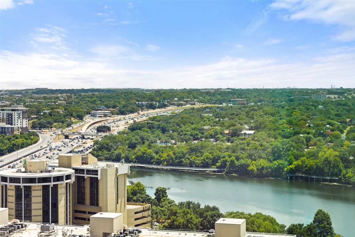 48 East Avenue, Unit 2405 Austin, TX 78701 - Photo 24 of 40 an aerial view of a house with a garden and lake view