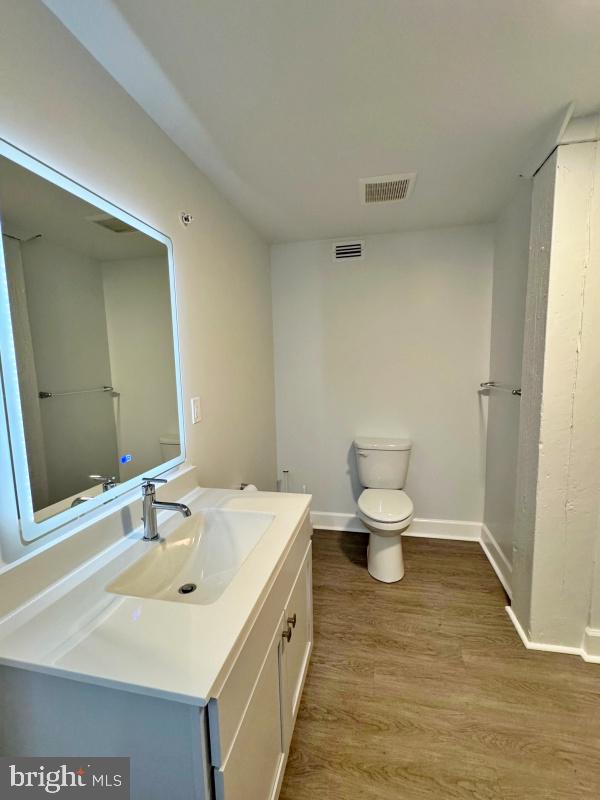 50 North Duke Street, Unit 305 York, PA 17401 - Photo 7 of 10 a bathroom with a sink and a toilet
